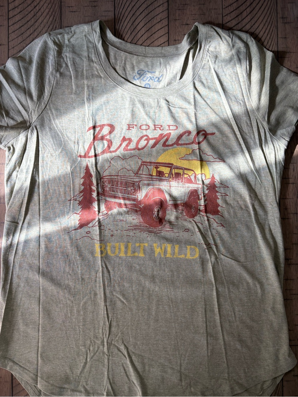 Ford women’s  Bronco Graphic Tee in Olive with Red and Yellow Print